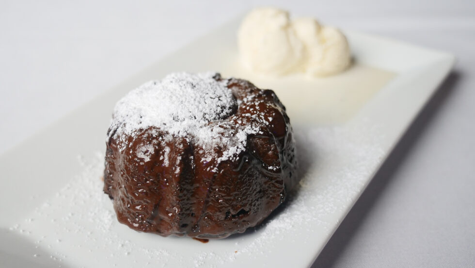 Warm chocolate dessert with ice cream