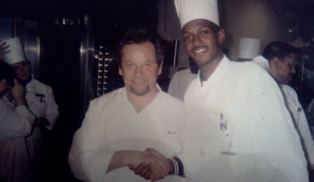 Chef Marvil Rodney with Wolfgang Puck during his early culinary career